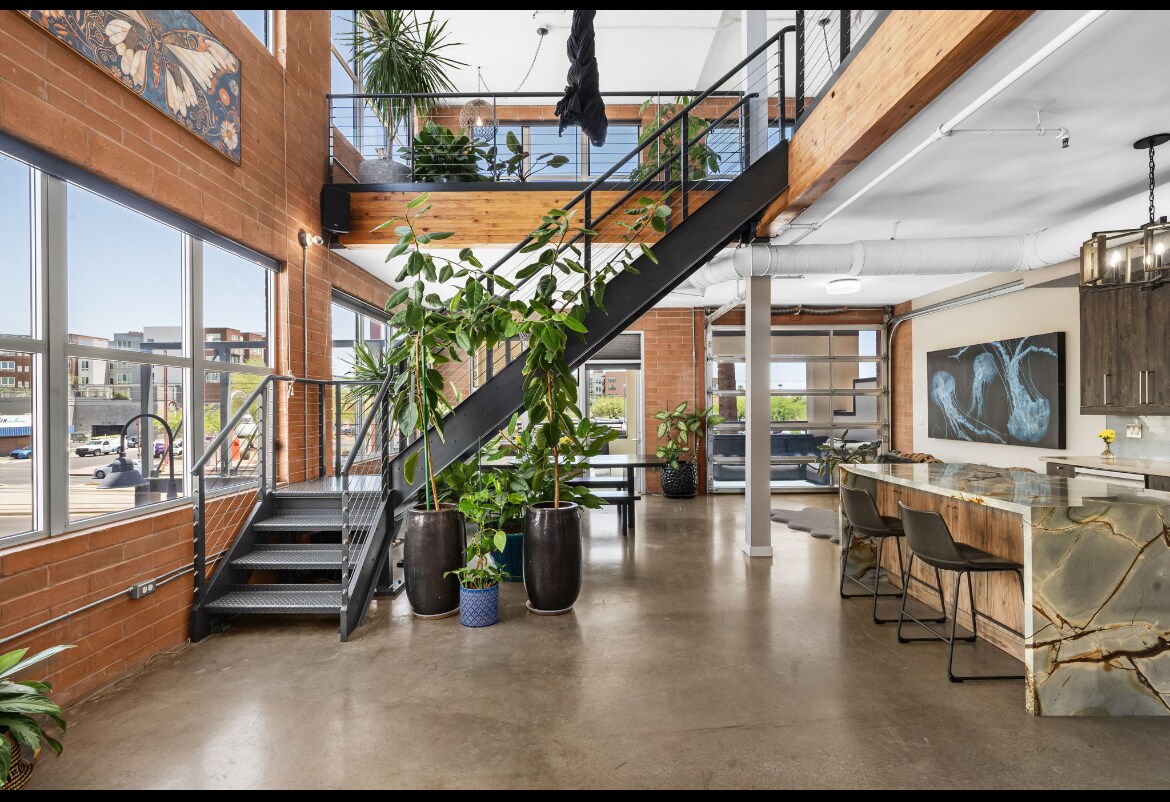 Modern Industrial Apartment With Loft photo