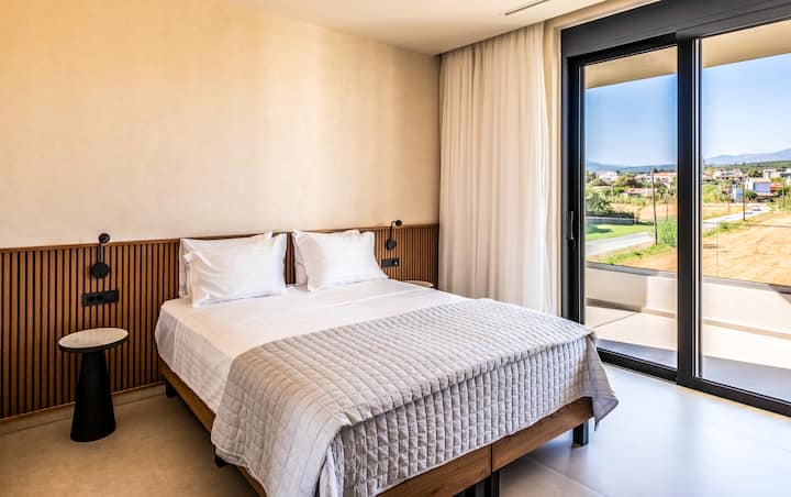 Villa 1 - First Floor - Bedroom 3 with queen bed, ensuite bathroom and balcony access