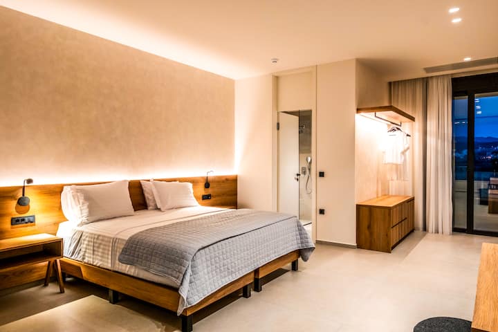 Villa 1 - First Floor - Bedroom 2 with queen bed, ensuite bathroom and balcony access