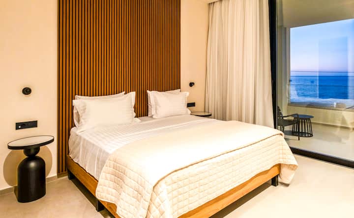 Villa 2 - First Floor - Bedroom 6 with queen bed, ensuite bathroom and balcony access