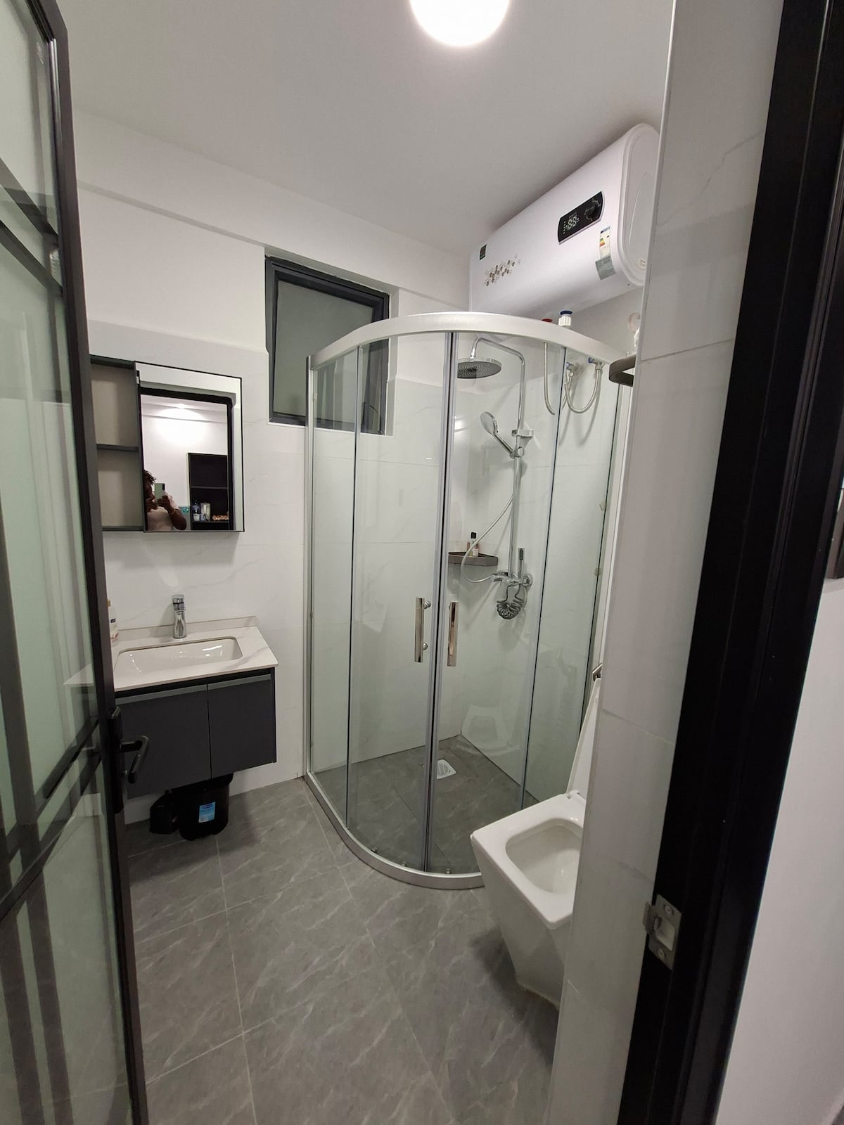 Bathroom with glass shower enclosure