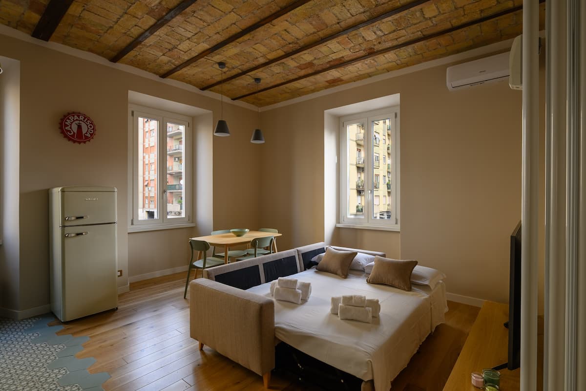 I sapori di Testaccio • Autentico loft romano per 4 persone — Salotto 2 | Casa vacanze LovedHomes a Roma
