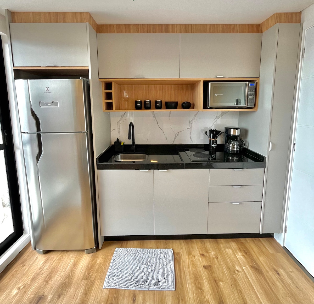 Top Airbnb: Modern + garage + great location | great value em Novo Mundo