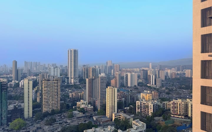 NESCO 2BHK · High-Floor Skyline Views · Guest Favourite · Goregaon Mumbai · Sleeps 5 - 3