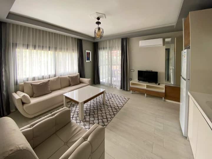 Ortak Havuzlu Denize Yakın 1+1 Tatil Evi - Kuşadası