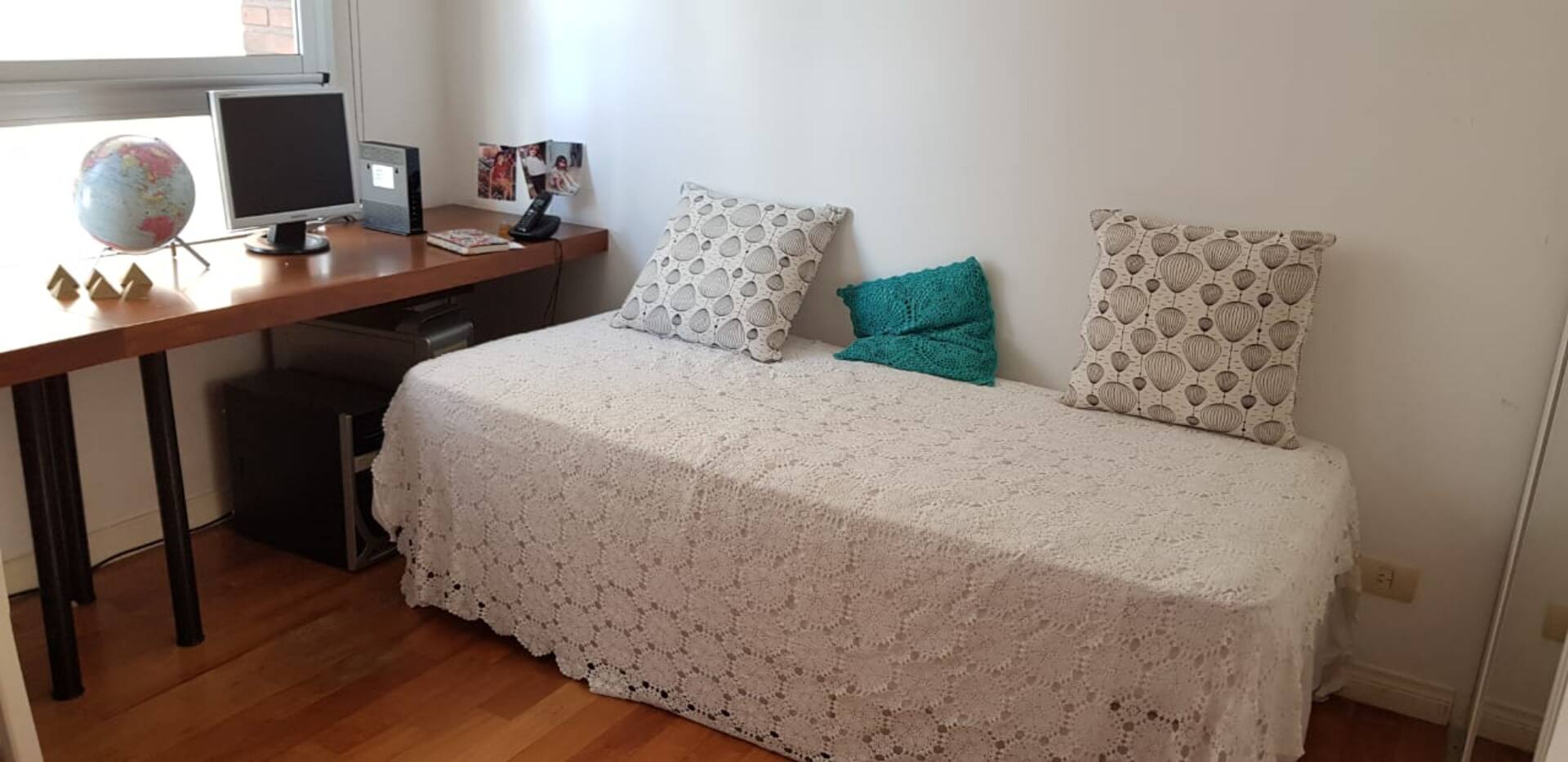 Spacious bedroom with en-suite bathroom and desk