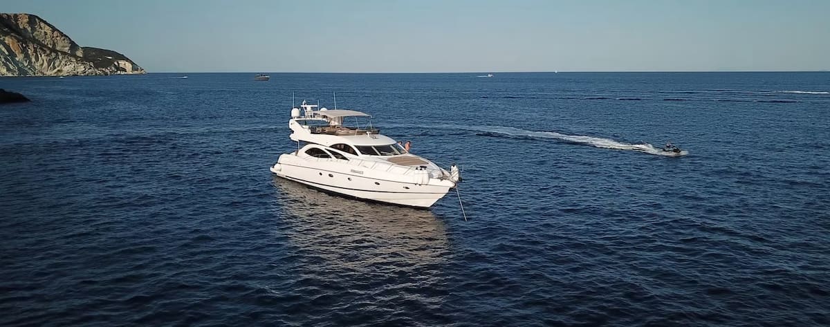 Amato at anchor — open Mediterranean waters