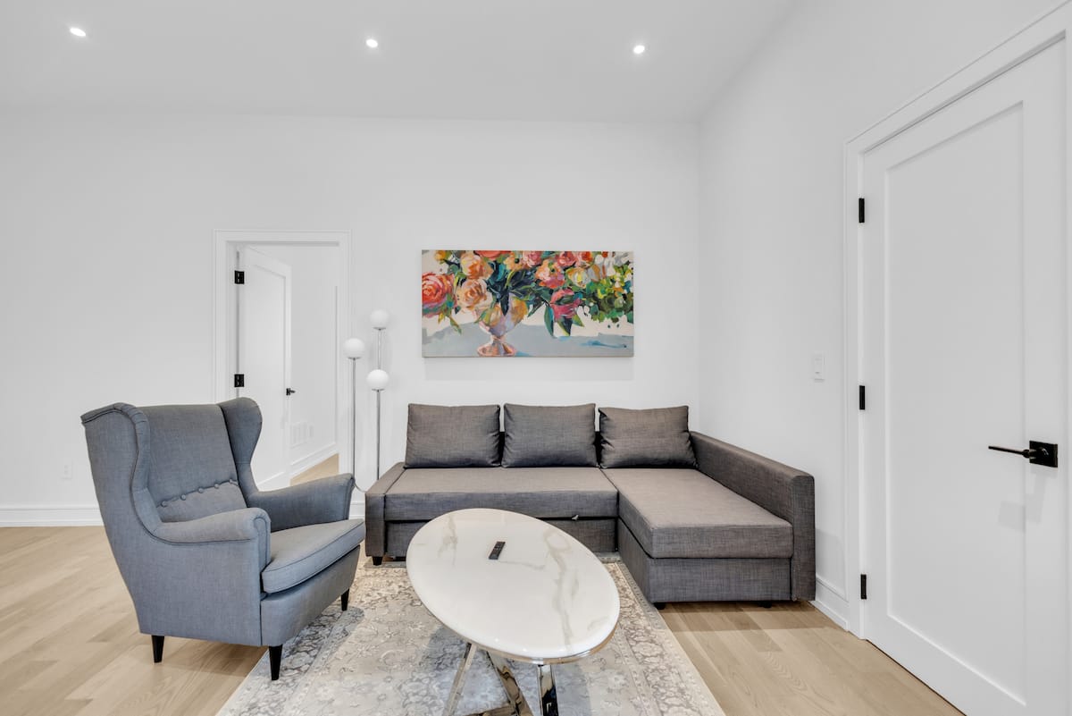 King bedroom in a three bedroom Mississauga short term rental