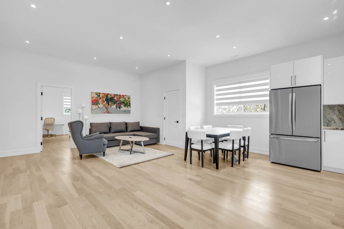 Living area of a modern three bedroom furnished apartment in Mississauga