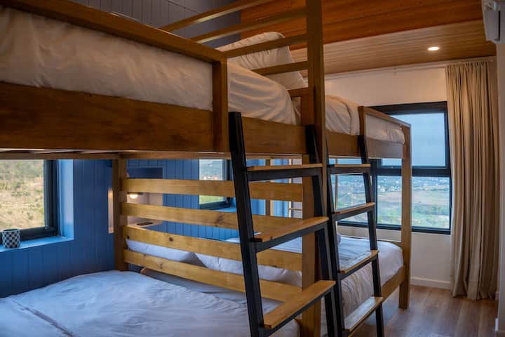 Climb up for a view — the bunks even catch a bit of scenery through the side window.