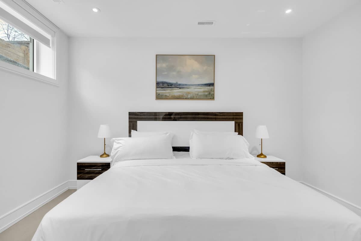 King bedroom in a two bedroom Mississauga furnished suite