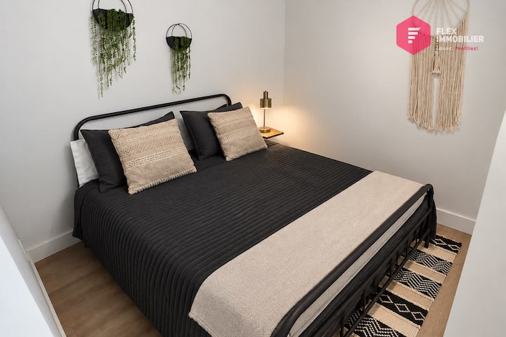 Bedroom #3 — Open sleeping area on the mezzanine, with a double bed, no door. Accessible directly from the stair landing, with an adjacent bathroom.