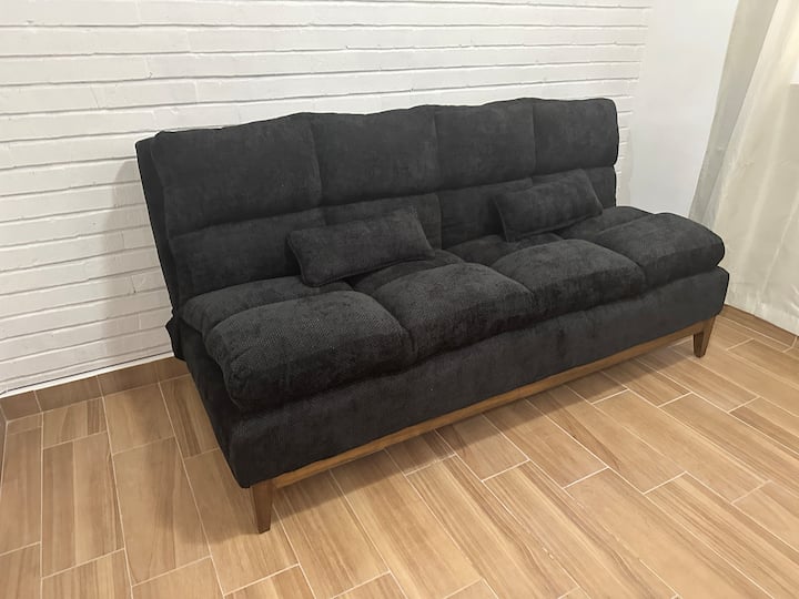 Cómoda estancia con sofá-cama individual.
