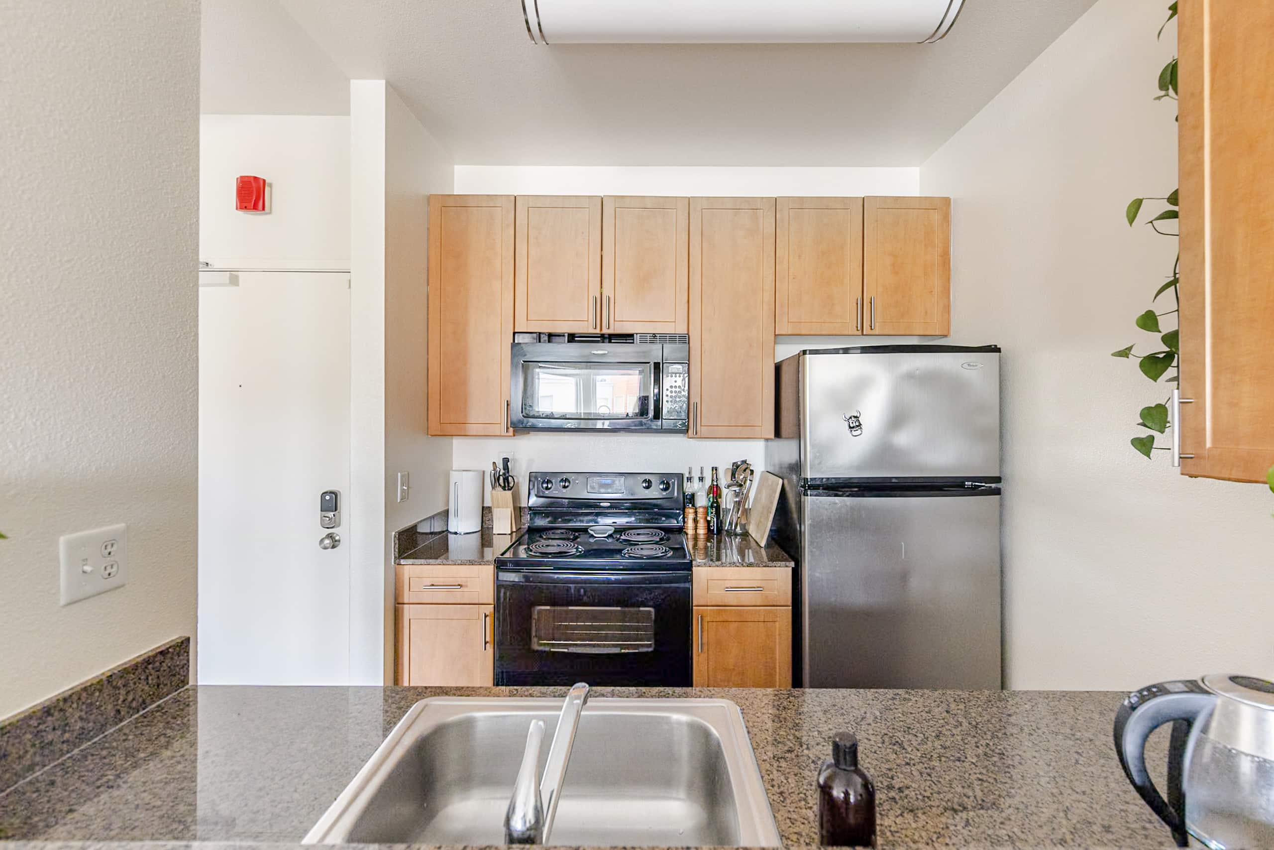 Sunlit Top-Floor 1BR w/ Pool View - Image 8