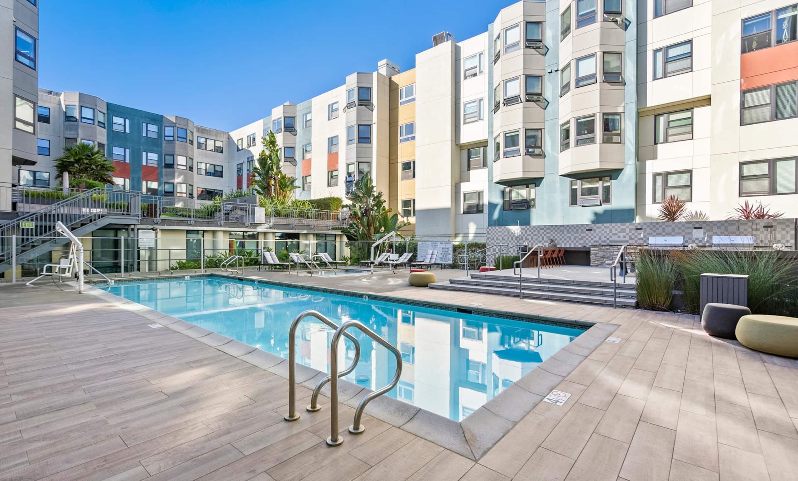 Sunlit Top-Floor 1BR w/ Pool View - Image 22