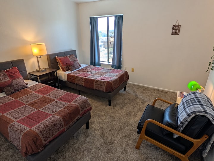 The second bedroom has two single beds with memory foam and are very comfortable.