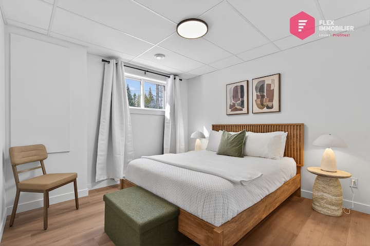 Comfortable bedroom #2 in the basement with a queen-size bed