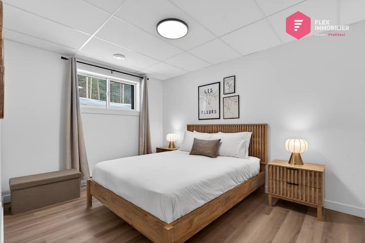 Comfortable bedroom #3 in the basement with a queen-size bed
