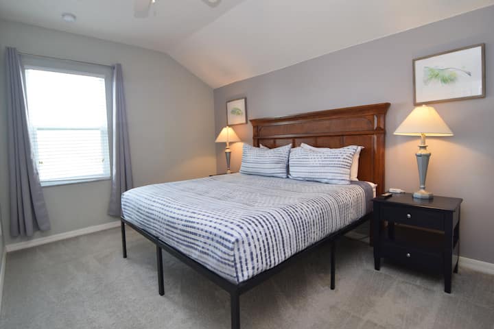 Second king primary suite upstairs with TV, en suite bathroom, walk-in closet