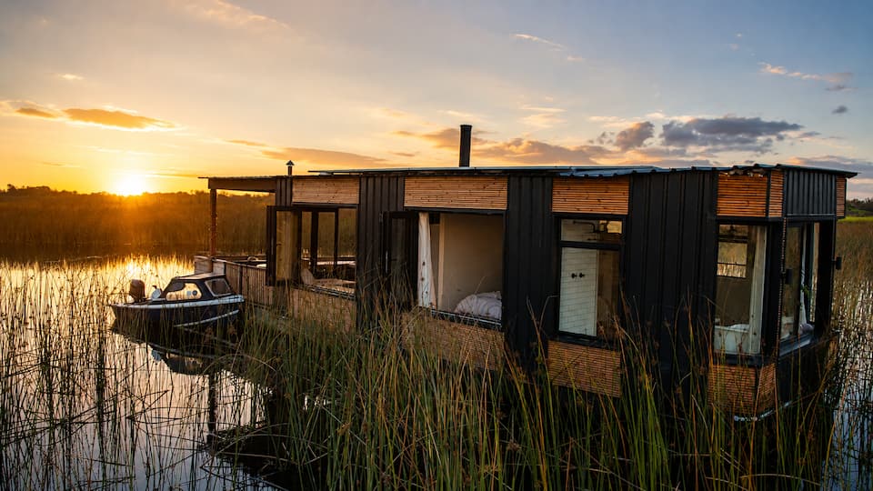 A floating cabin hidden in the reeds, Pearly Beach, Western Cape, South Africa, photo 3 of 10
