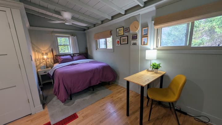 Queen bed and dedicated workspace - purple door unit