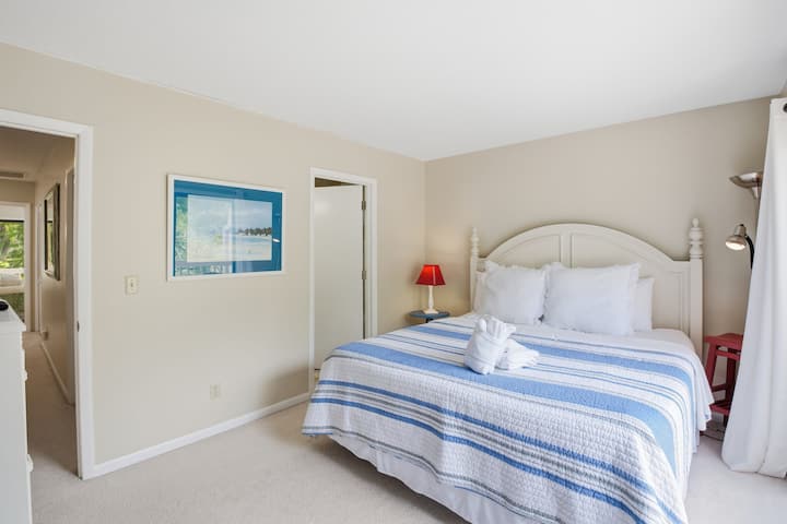 King Bed in first bedroom with its own balcony and bathroom