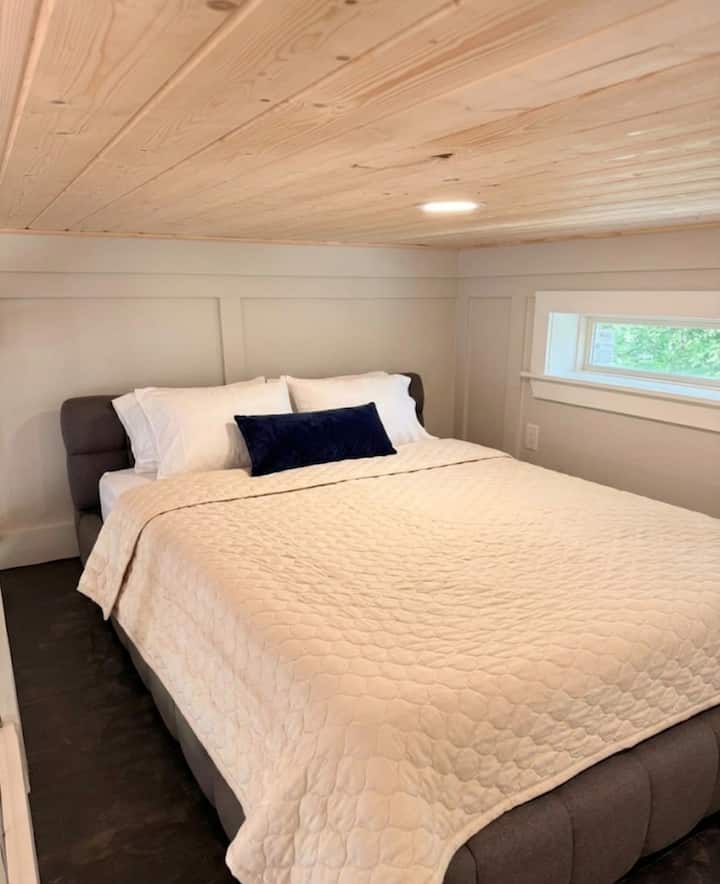 Nightfall Guest Cabin bedroom with queen bed