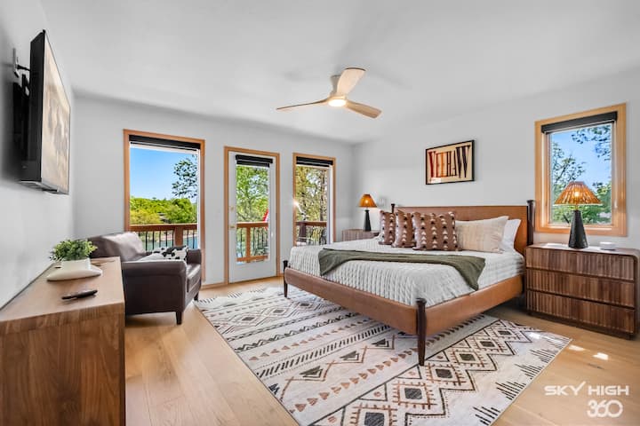 Primary bedroom with a king size bed & Smart TV for streaming from your own accounts!