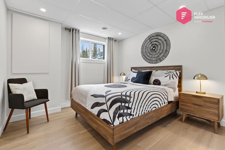 Comfortable bedroom #3 in the basement with queen bed and double wardrobe