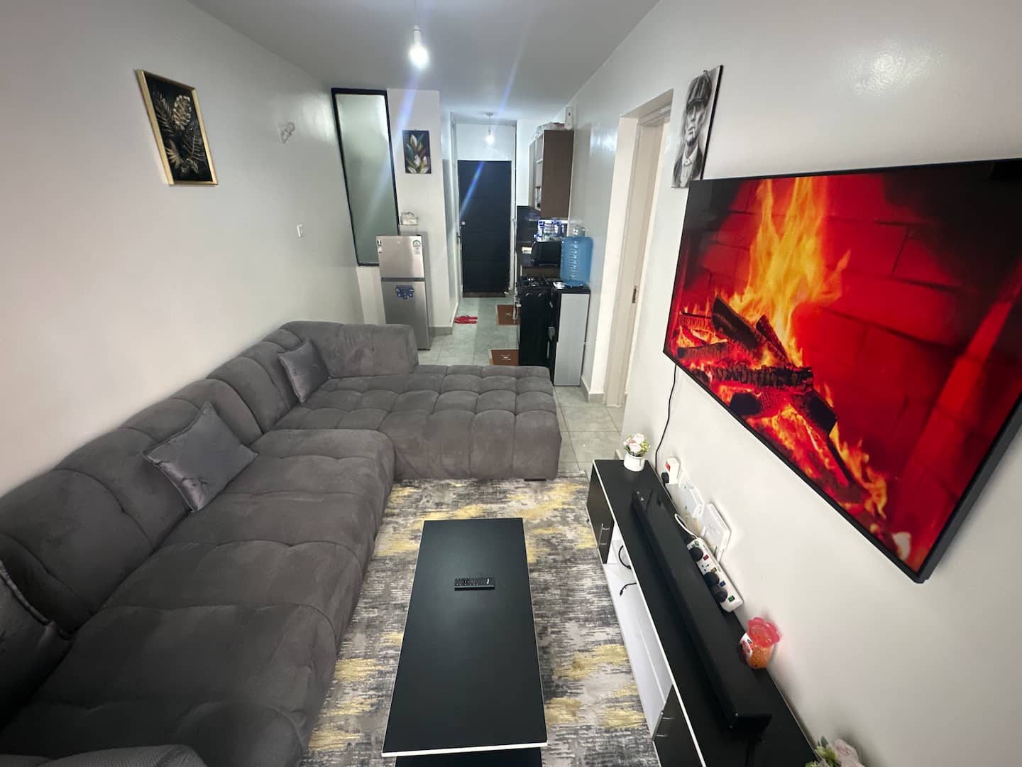 Open-plan living with cinematic fireplace