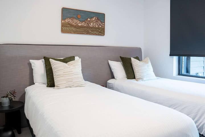 The second bedroom features a king bed that can be reconfigured into two twins upon guest request prior to check-in.
