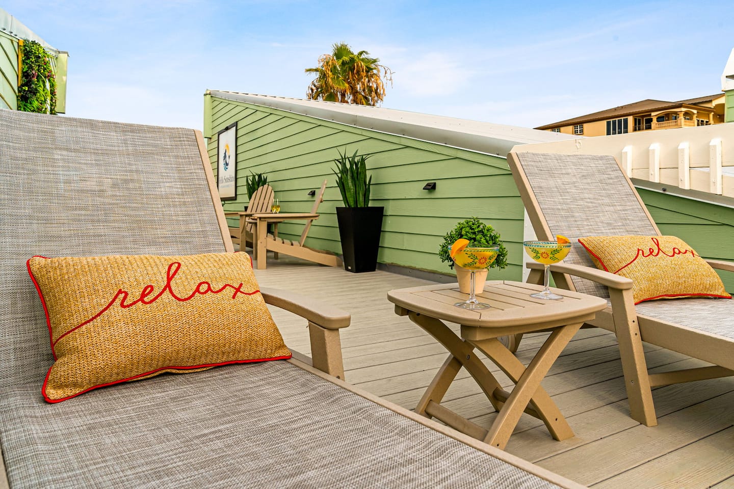 Rooftop loungers and a cocktail up top.