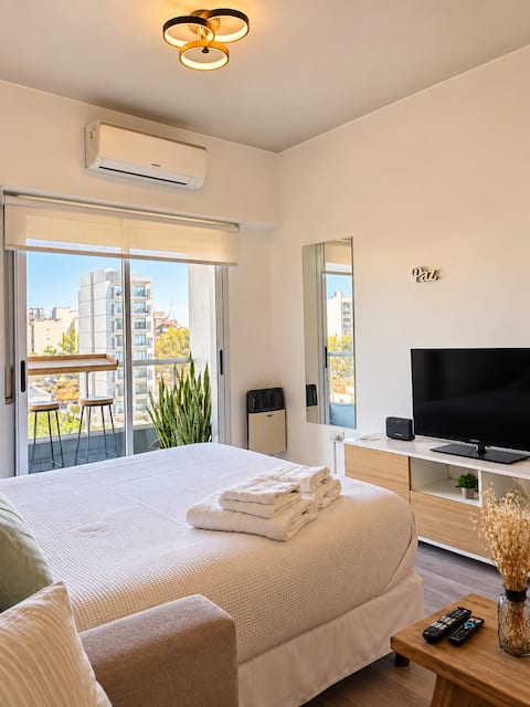 Top performing Airbnb: Modern and bright studio apartment | Comfort and style in La Plata