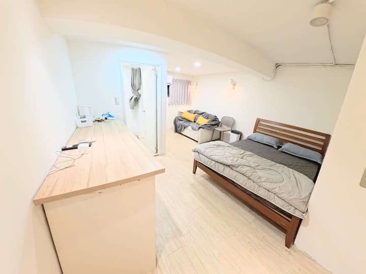 Workspace evidence from Decoration Room (2–4 people) 1st floor, spacious double room, 6 stops to Taipei Main Station, private bathroom, washing machine