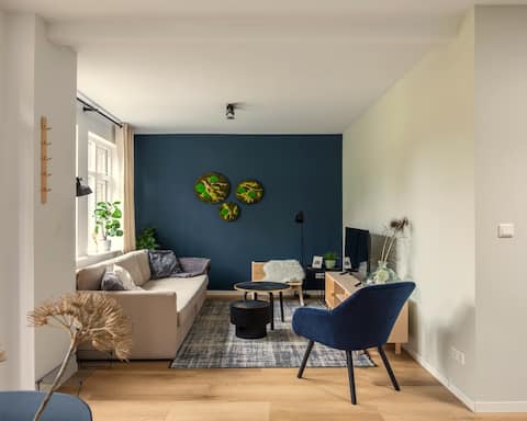 Popular Airbnb listing: Forest‑edge luxury cottage with designer kitchen in Putten