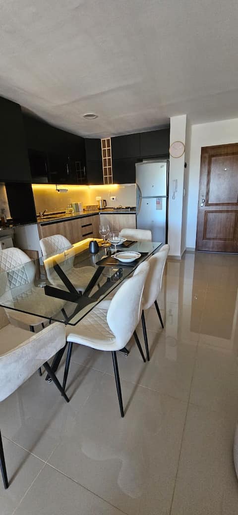 Top performing Airbnb: Oceanfront apartment in San Luis near shopping in San Luis