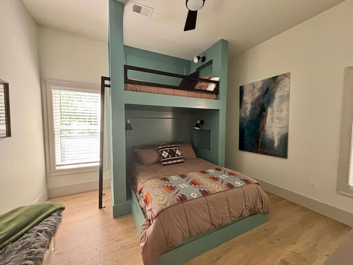 High-end cabin bedroom featuring bunk beds.