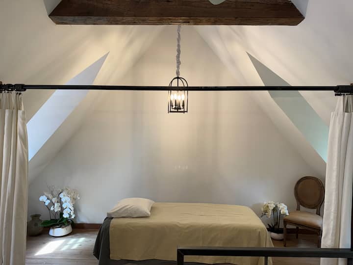 Cabin (open-concept boutique design) * Upper level: Open loft with three twin beds across two drape-divided sleeping areas, ideal for kids or teens. This level also houses two massage tables for in-property treatment bookings.