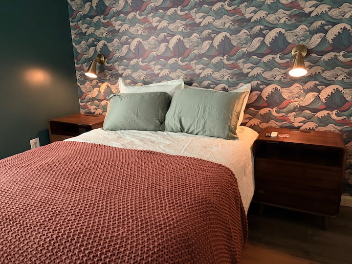 Bedroom 2 has a queen bed