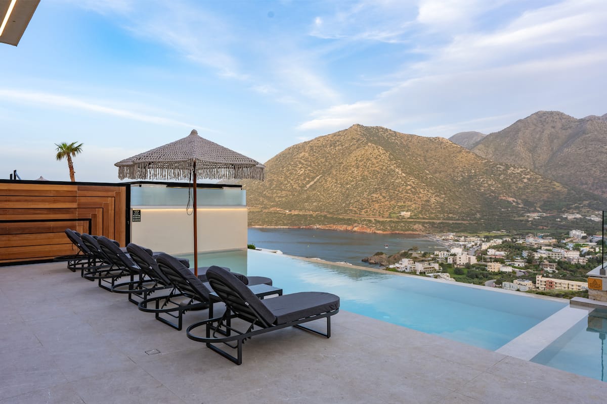 Pools, terraces and outdoor dining at AZUR Luxury Villas