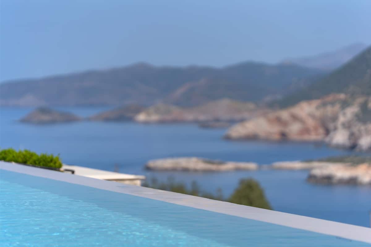 Pools, terraces and outdoor dining at AZUR Luxury Villas