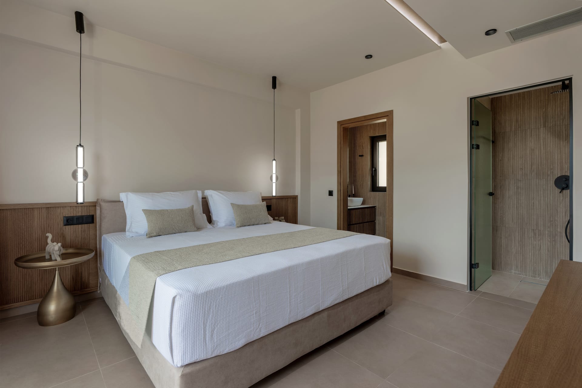 Ensuite bedroom with balcony over the bay