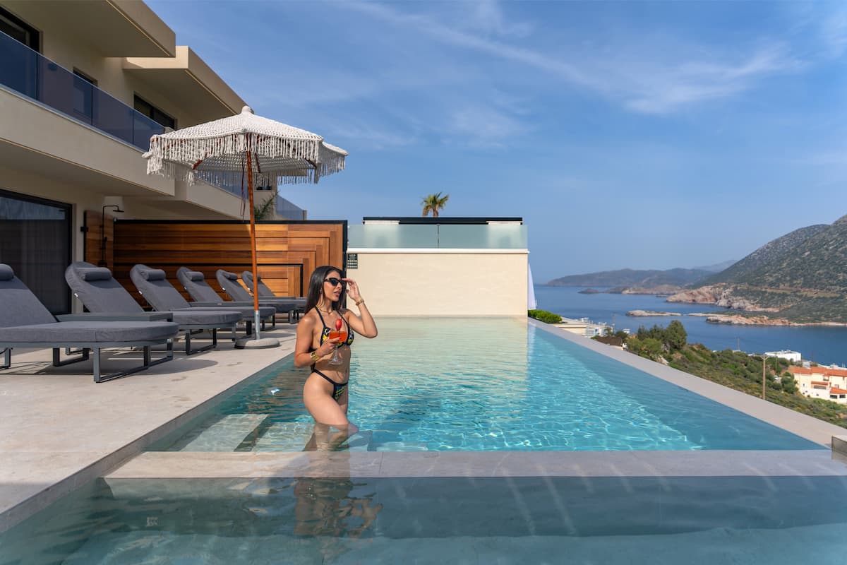 Pools, terraces and outdoor dining at AZUR Luxury Villas