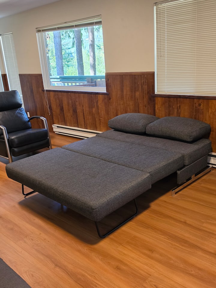 Need a little extra sleeping space? One of the living room sofas folds out into a queen bed for a cozy night’s rest.