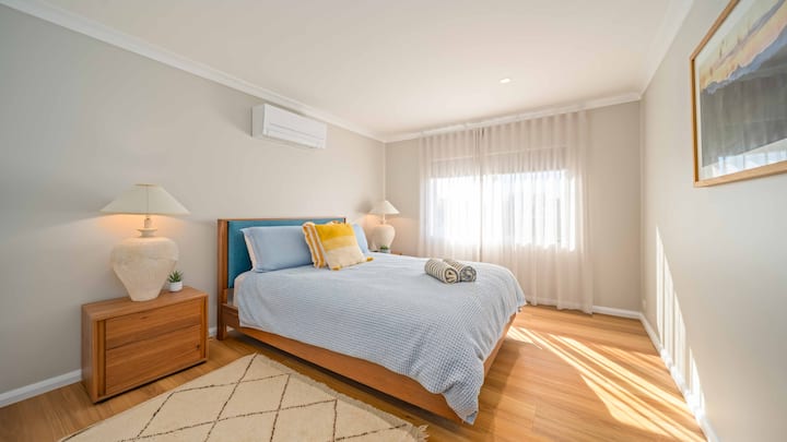 Queen bedroom with AC and built in robes