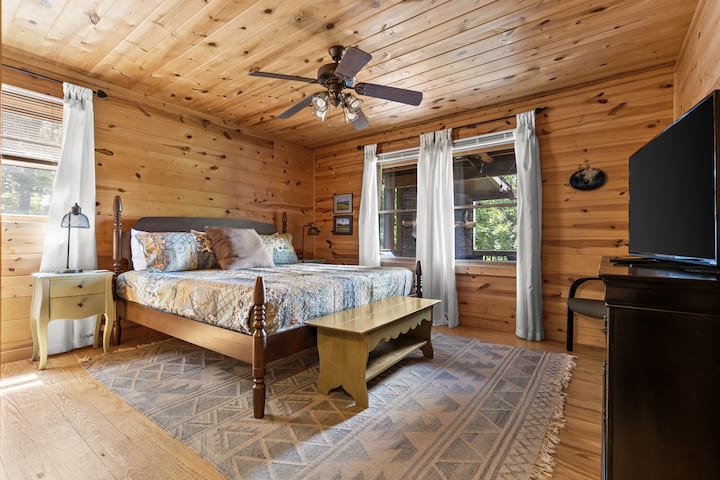 Buck Moon Suite - a spacious main-level king suite with rustic Appalachian charm and private ensuite bathroom.