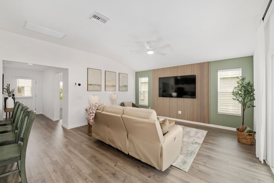 Living room with feature wall and TV