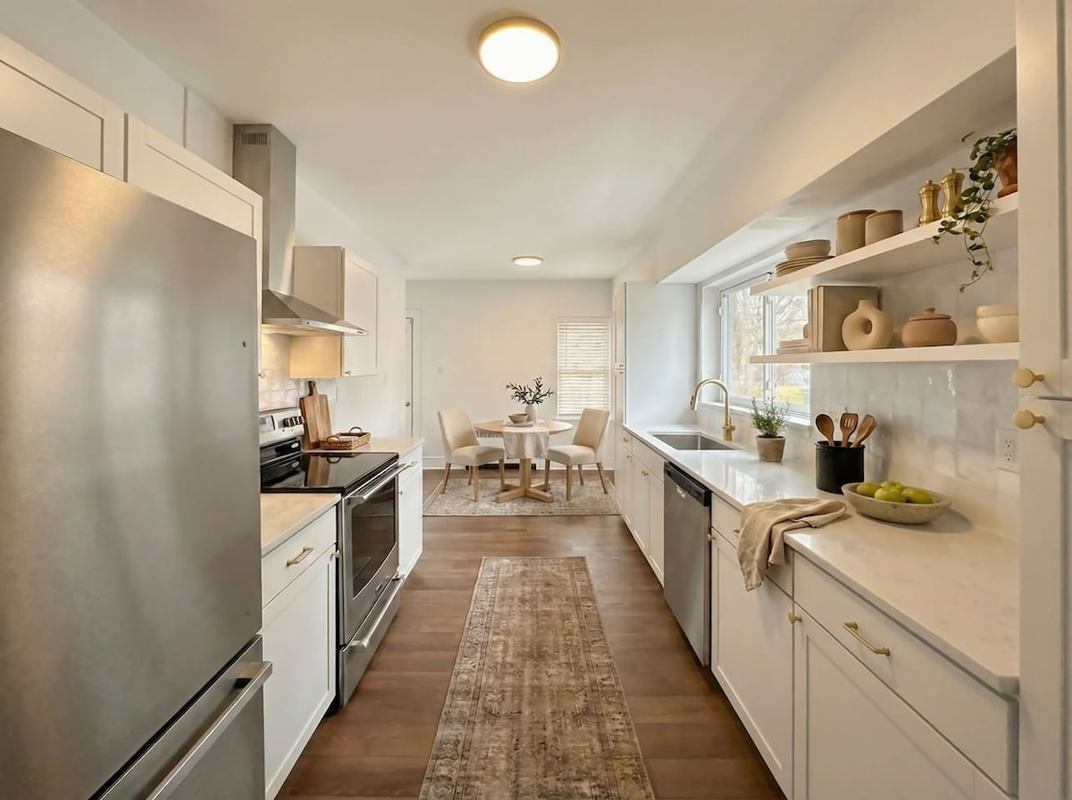 Kitchen with stainless range and open shelving