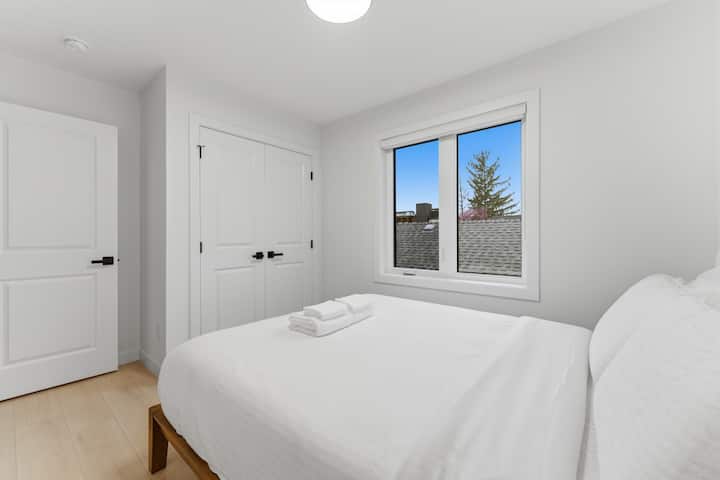 Third bedroom - Queen bed with memory foam mattress and memory foam pillows. Bright window for natural light with room darkening shades.