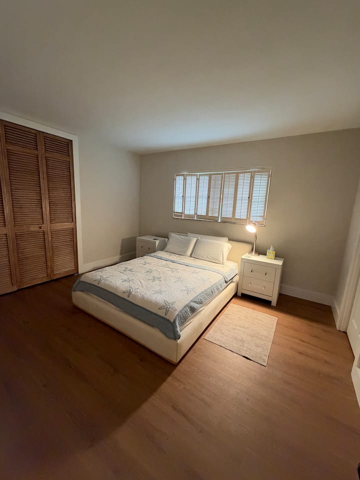 Bedroom 3 with queen bed and bathroom that is shared with office/workout room. The bathroom has tub/shower. This bedroom has a 55” TV.